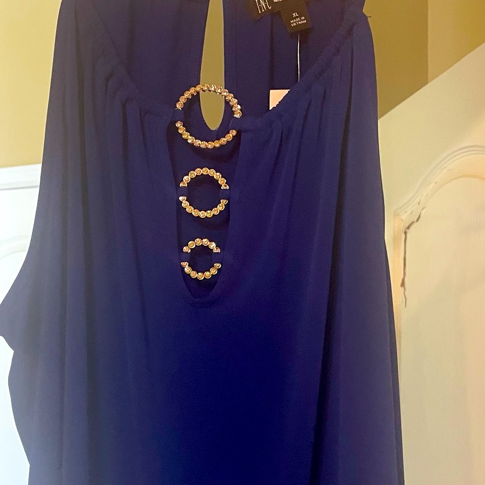 Brand new with tags!  Beautiful INC top with stones.